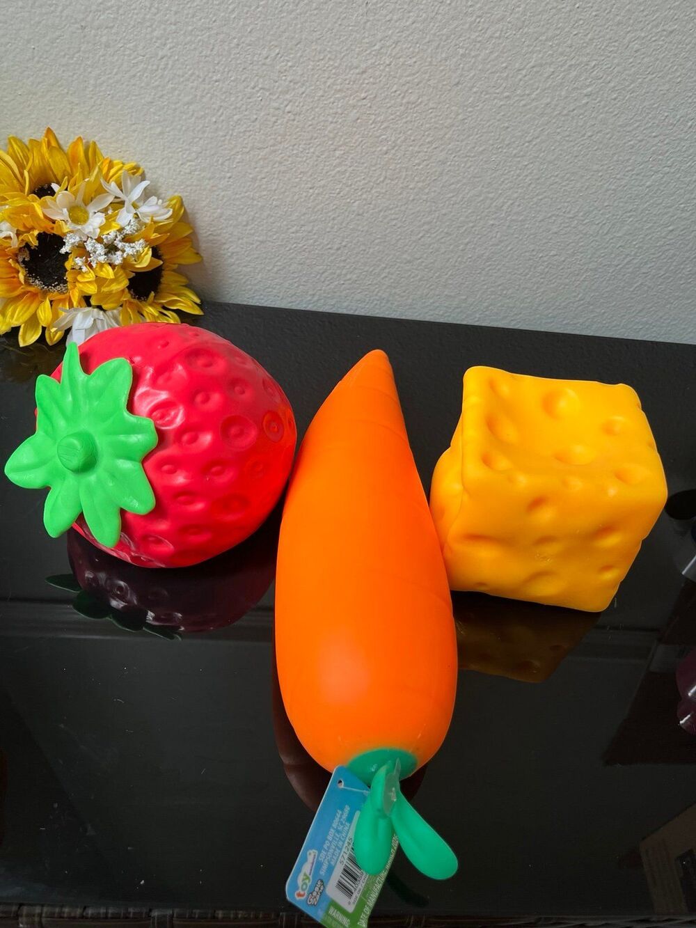 Squishy toy carrot, strawberry, and cheese block